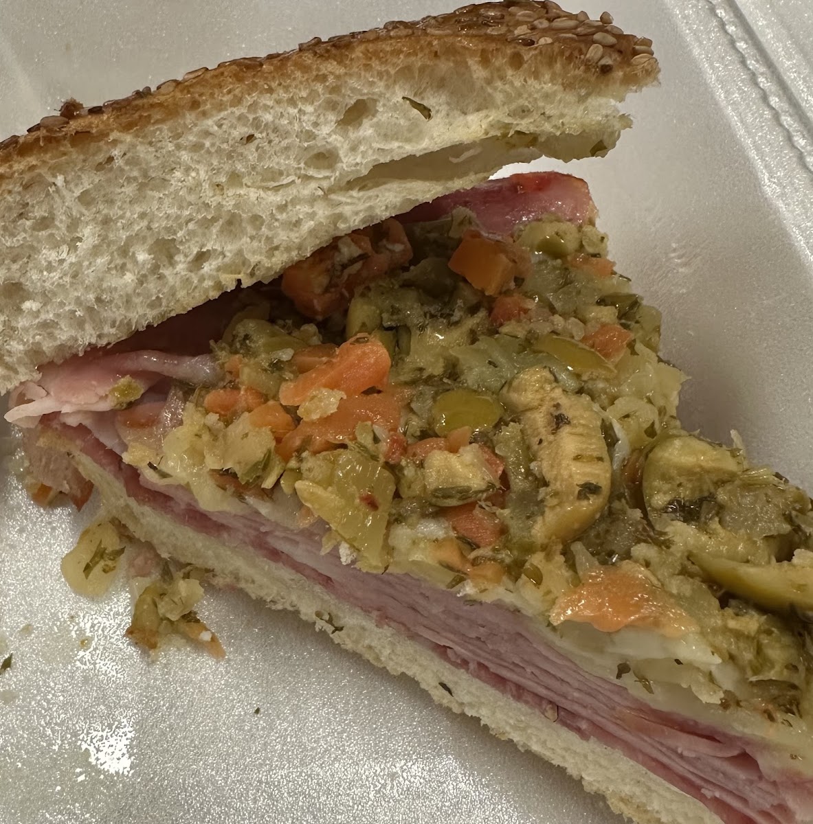 Baby muffuletta (bun) at NOLA Poboys, Bourbon Street New Orleans